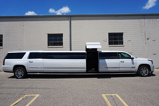 20 passenger caddy escalade limo exterior
